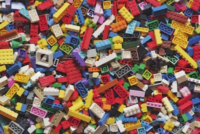 Child playing with colorful beads
